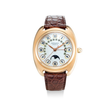 View full screen - View 1 of Lot 606. HERMÈS | DRESSAGE II, REFERENCE DR2.770.213, A LIMITED EDITION PINK GOLD WRISTWATCH WITH MOON PHASES, RETROGRADE DATE AND MOTHER-OF-PEARL DIAL, CIRCA 2005.