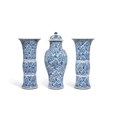 View full screen - View 1 of Lot 198. A large three-piece blue and white 'floral' garniture, Qing dynasty, Kangxi period.