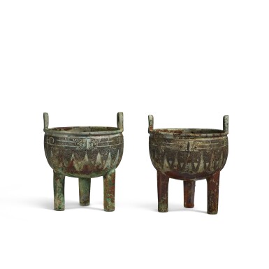 View full screen - View 1 of Lot 1. An extremely rare pair of archaic bronze ritual food vessels (Ding), Late Shang dynasty | 商末 子龔鼎一對.