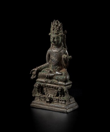 View full screen - View 1 of Lot 198. A silver-inlaid copper alloy figure of crowned Buddha, Swat valley, 8th - 9th century | 斯瓦特縣地區 八至九世紀 合金銅錯銀佛坐像.