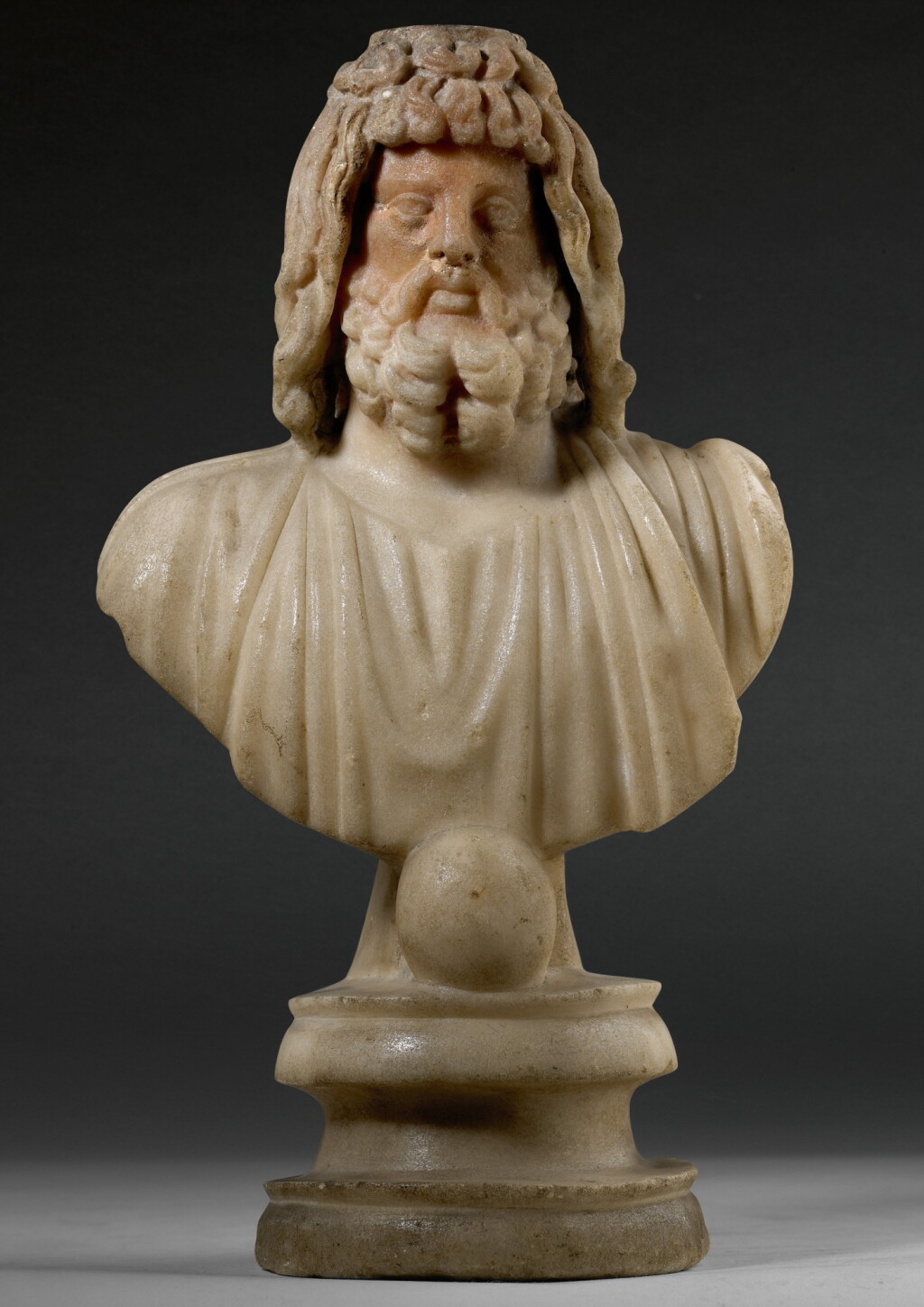 View full screen - View 1 of Lot 31. A ROMAN MARBLE BUST OF SARAPIS, CIRCA 2ND CENTURY A.D..