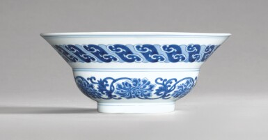View full screen - View 1 of Lot 27. A BLUE AND WHITE OGEE BOWL, YONGZHENG MARK AND PERIOD | 清雍正 青花纏枝菊花紋折腰盌 《大清雍正年製》款.