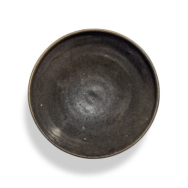 View full screen - View 1 of Lot 767. A large black-glazed 'oil spot' bowl, Jin dynasty | 金 黑釉油滴紋大盌.