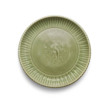View full screen - View 1 of Lot 169. A 'Longquan' celadon-glazed 'peony' dish, Ming dynasty | 明 龍泉青釉印牡丹紋菊瓣盤.