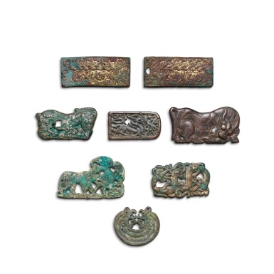 View full screen - View 1 of Lot 1037. Eight Ordos bronze 'animal' plaques, Eastern Zhou dynasty, Warring States period - Han dynasty | 東周戰國至漢 鄂爾多斯青銅動物飾牌八件.