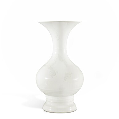 View full screen - View 1 of Lot 188. A white-glazed 'dragon' vase, Qing dynasty, Kangxi period.