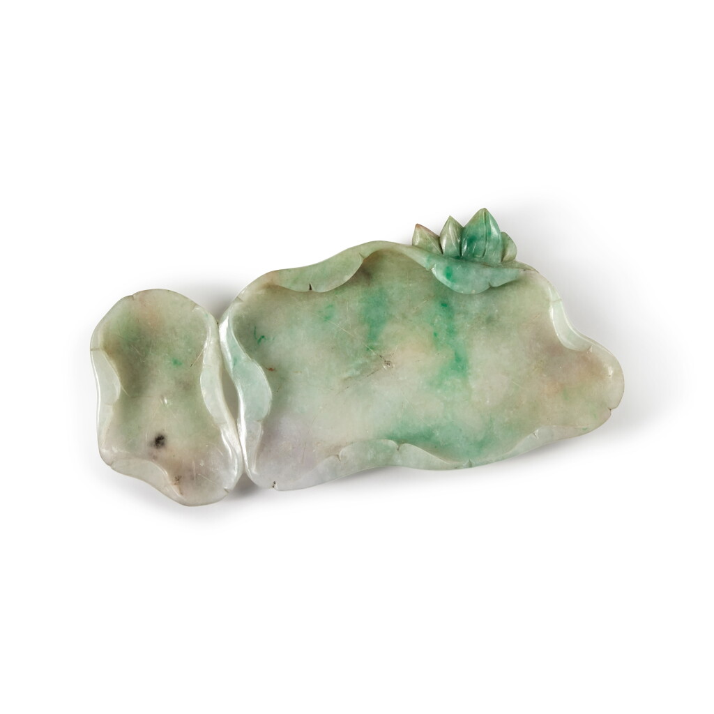 View full screen - View 1 of Lot 663. A jadeite lotus-leaf-form brushwasher, 19th / 20th century | 十九 / 二十世紀 翠玉雕荷葉形筆掭.