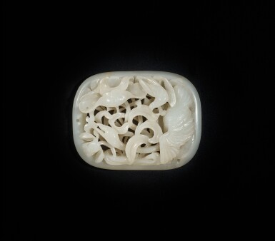 View full screen - View 1 of Lot 832. A white celadon jade openwork 'lotus and crane' plaque, Yuan dynasty | 元 白玉鏤雕海東青啄雁紋珮.
