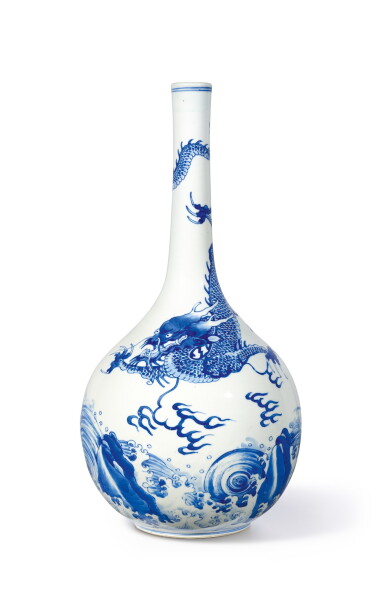 View full screen - View 1 of Lot 15. A blue and white 'carp and dragon' bottle vase, Qing dynasty, Kangxi period | 清康熙 青花鯉躍龍門長頸瓶.