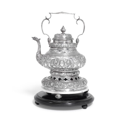 View full screen - View 1 of Lot 103. A Dutch 18th century silver teapot on later heater base, maker's mark indistinct initials crowned, Sneek, 1742.