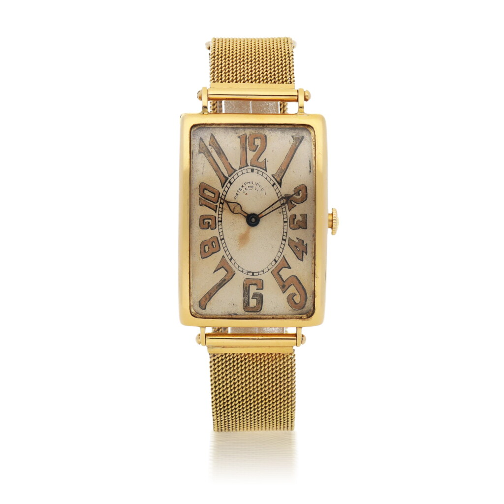 View full screen - View 1 of Lot 152. PATEK PHILIPPE | 'ART DECO', REF 11 LARGE YELLOW GOLD WRISTWATCH WITH 'EXPLODING NUMERALS' AND GAY FRERES BRACELET MADE IN 1919.