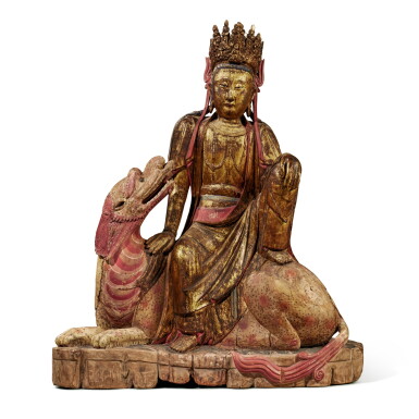 View full screen - View 1 of Lot 685. A polychrome-painted and gilt-decorated wood seated figure of a Guanyin, Qing dynasty, 18th century | 清十八世紀 木加彩觀音像.