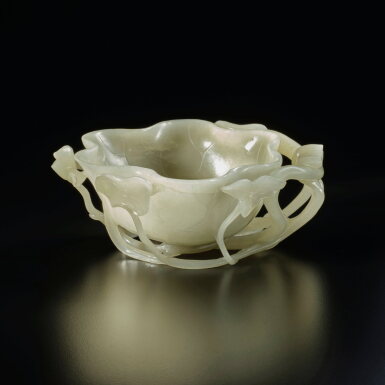 View full screen - View 1 of Lot 277. A celadon jade 'lotus' brush washer, Qing dynasty, 18th century | 清十八世紀 青玉雕荷花式洗.