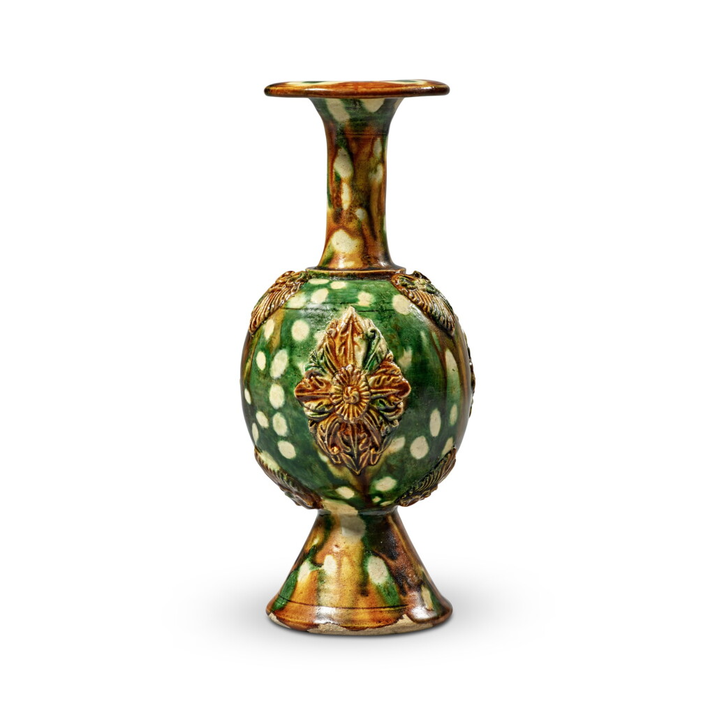 View full screen - View 1 of Lot 172. A rare sancai-glazed pottery bottle vase, Tang dynasty | 唐 三彩貼花瓶.