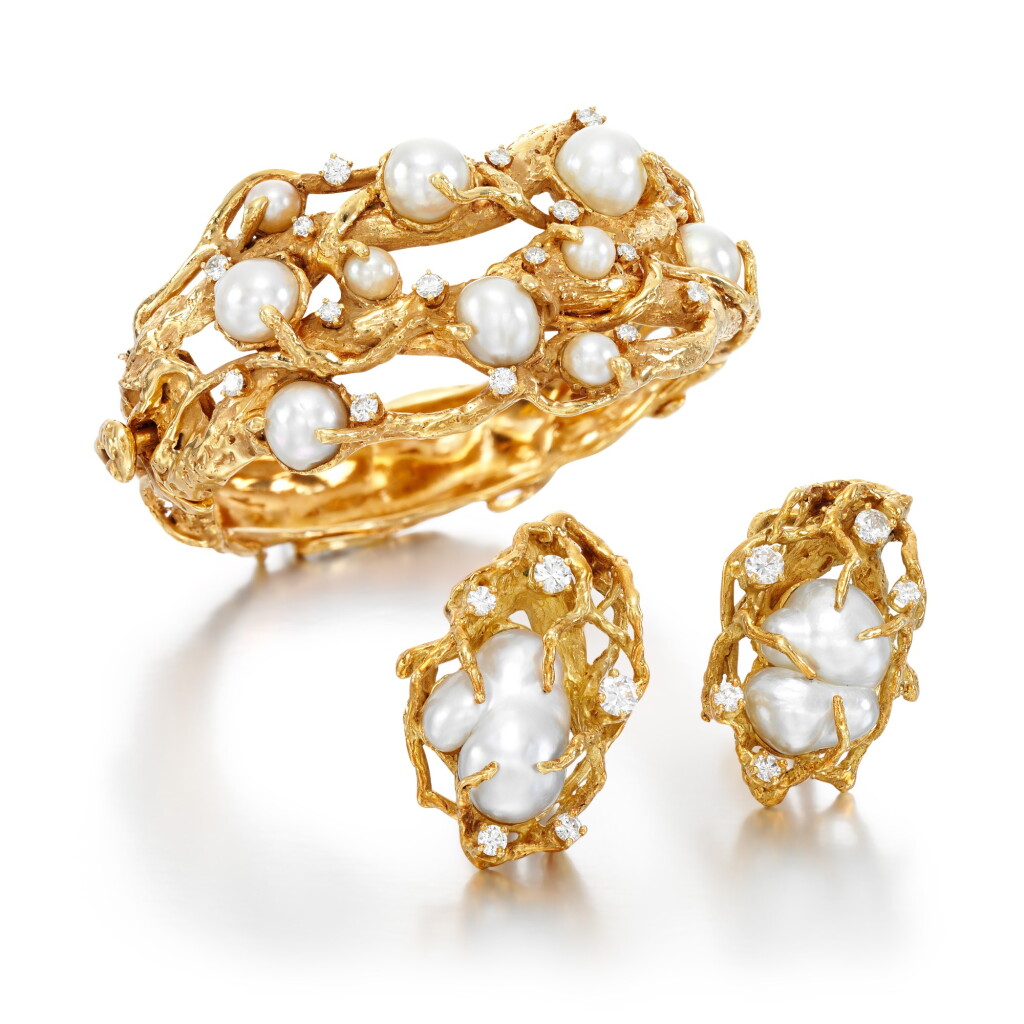 View full screen - View 1 of Lot 31. Arthur King | Cultured pearl and diamond bangle, 1970s || Pair of baroque cultured pearl and diamond ear clips, 1970s.