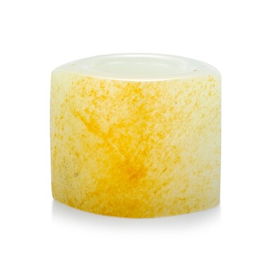 View full screen - View 1 of Lot 651. A WHITE AND RUSSET JADE THUMB RING QING DYNASTY | 清 白玉帶皮扳指.