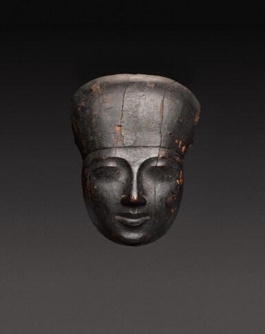 View full screen - View 1 of Lot 136. An Egyptian Wood Mummy Mask, 21st/22nd Dynasty, 1075-716 B.C..