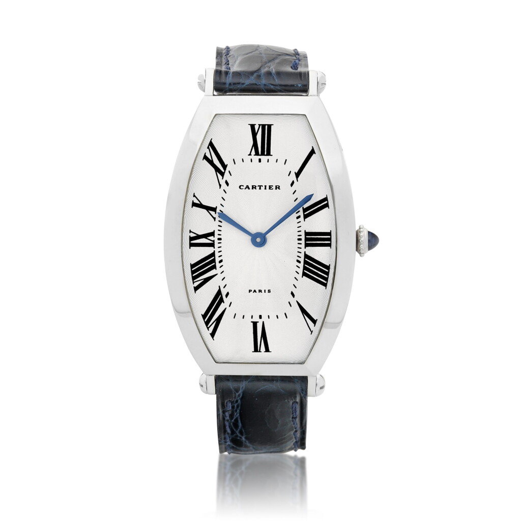 View full screen - View 1 of Lot 8028. Tonneau XL, Reference 2435 | A platinum wristwatch, Circa 1990 | 卡地亞 | Tonneau XL 型號2435 | 鉑金腕錶,約1990年製.