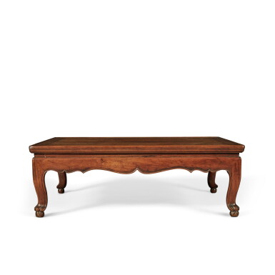 View full screen - View 1 of Lot 235. A 'huanghuali' low table (Kangzhuo), 17th century | 十七世紀 黃花梨有束腰壺門牙子虎爪足炕桌.