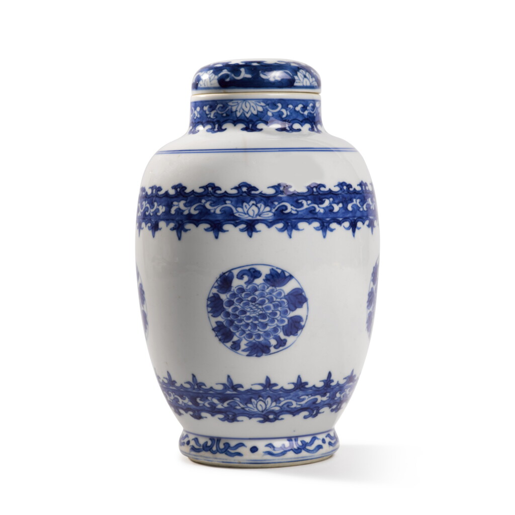 View full screen - View 1 of Lot 1750. A Chinese Blue and White Ovoid Jar and Cover, Qing Dynasty, 18th Century | 清十八世紀 青花團花紋蓋罐.