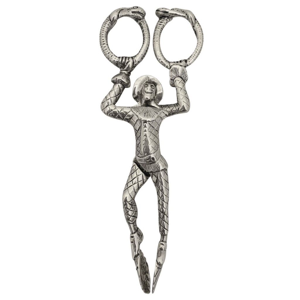 View full screen - View 1 of Lot 204. A PAIR OF REGENCY SILVER HARLEQUIN-FORM SUGAR NIPS, WILLIAM BARRETT OF LONDON, 1812.