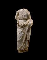 A ROMAN MARBLE FIGURE OF DIONYSOS, CIRCA 2ND CENTURY A.D.