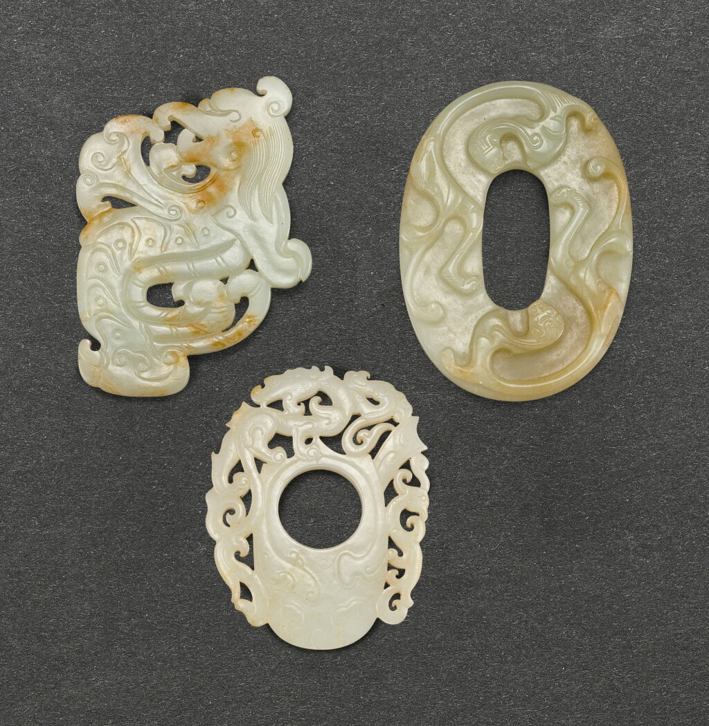 View full screen - View 1 of Lot 573. THREE ARCHAISTIC CELADON JADE 'CHILONG' PLAQUES QING DYNASTY | 清 青白玉螭龍飾一組三件.