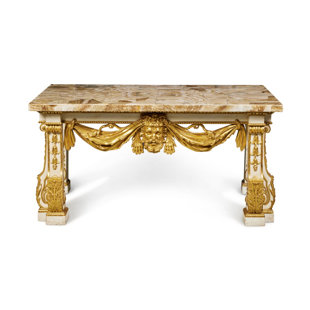 View full screen - View 1 of Lot 259. A George II Revival Cream-Painted and Parcel-Gilt Pier Table, after the model by Matthias Lock , Late 19th/Early 20th Century, with a later Alabastro Fiorito Marble Top.