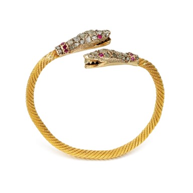 View full screen - View 1 of Lot 382. Ruby and diamond bangle, 1970s.