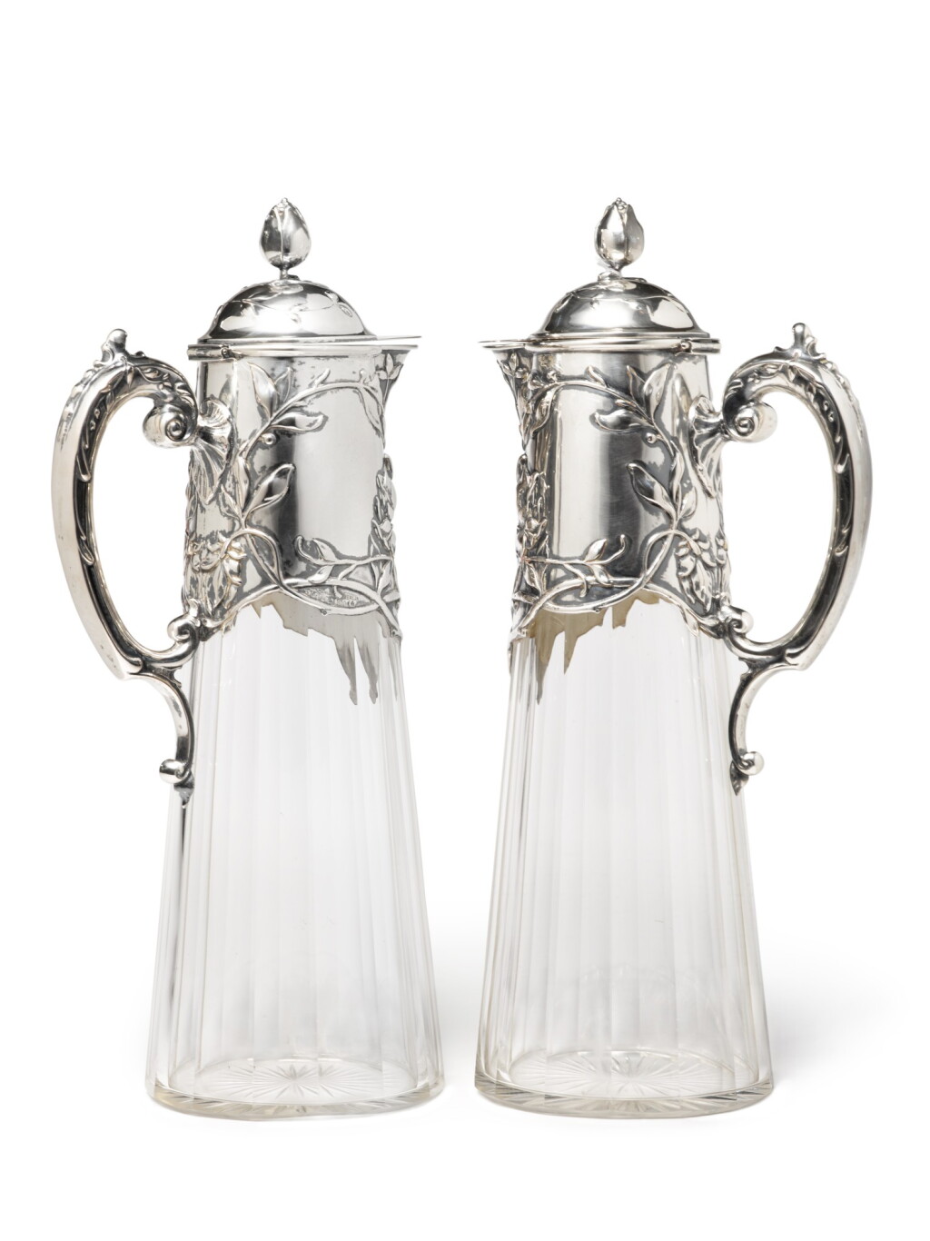 View full screen - View 1 of Lot 66. A Pair of German Art Nouveau Silver and Cut-Glass Claret Jugs, Koch & Bergfeld, Bremen, Retailed by J.H. Werner, Berlin, Circa 1900.