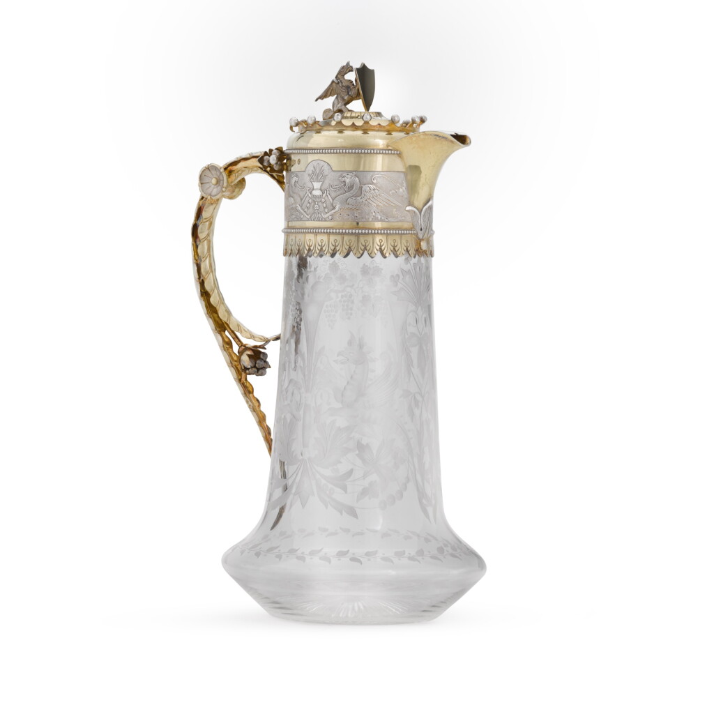 View full screen - View 1 of Lot 72. A Victorian silver-gilt-mounted glass claret jug, Frederick Elkington for Elkington & Co., Birmingham, 1877.