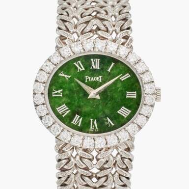 View full screen - View 1 of Lot 105. Reference 9804 N 21 | A white gold and diamond-set bracelet watch with jade dial, Circa 1970.