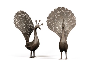 View full screen - View 1 of Lot 152. A pair of silver and brass-overlaid steel openwork peacocks, Persia, Qajar, 19th century.