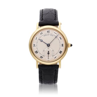 View full screen - View 1 of Lot 102. Reference 3210 | A yellow gold wristwatch, Circa 1990.