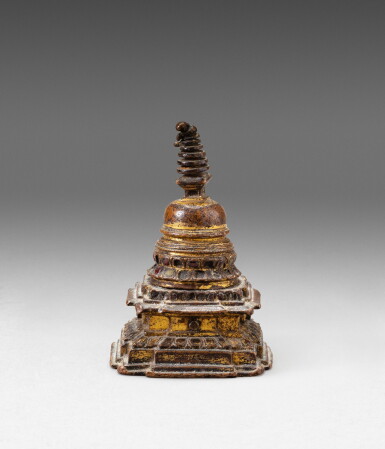 View full screen - View 1 of Lot 113. A small gilt-copper stupa Nepal, 15th century | 尼泊爾 十五世紀 鎏金銅佛塔.