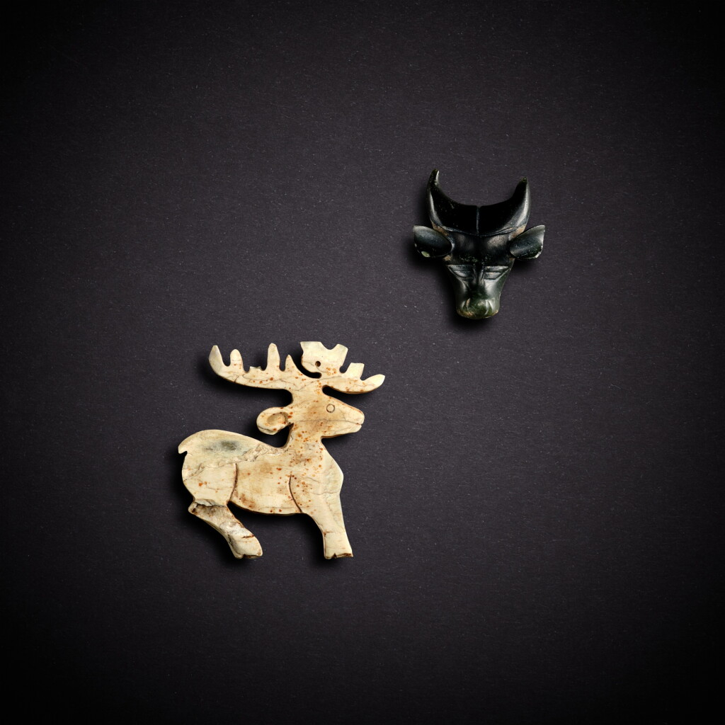 View full screen - View 1 of Lot 7862. A jade ox head and a jade deer, Western Zhou dynasty | 西周 玉牛首及玉鹿.