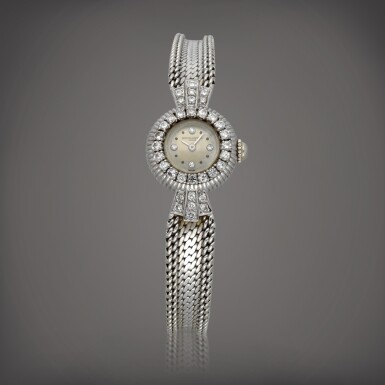 View full screen - View 1 of Lot 542. Reference 6172 | A white gold bracelet watch | Circa 1957.