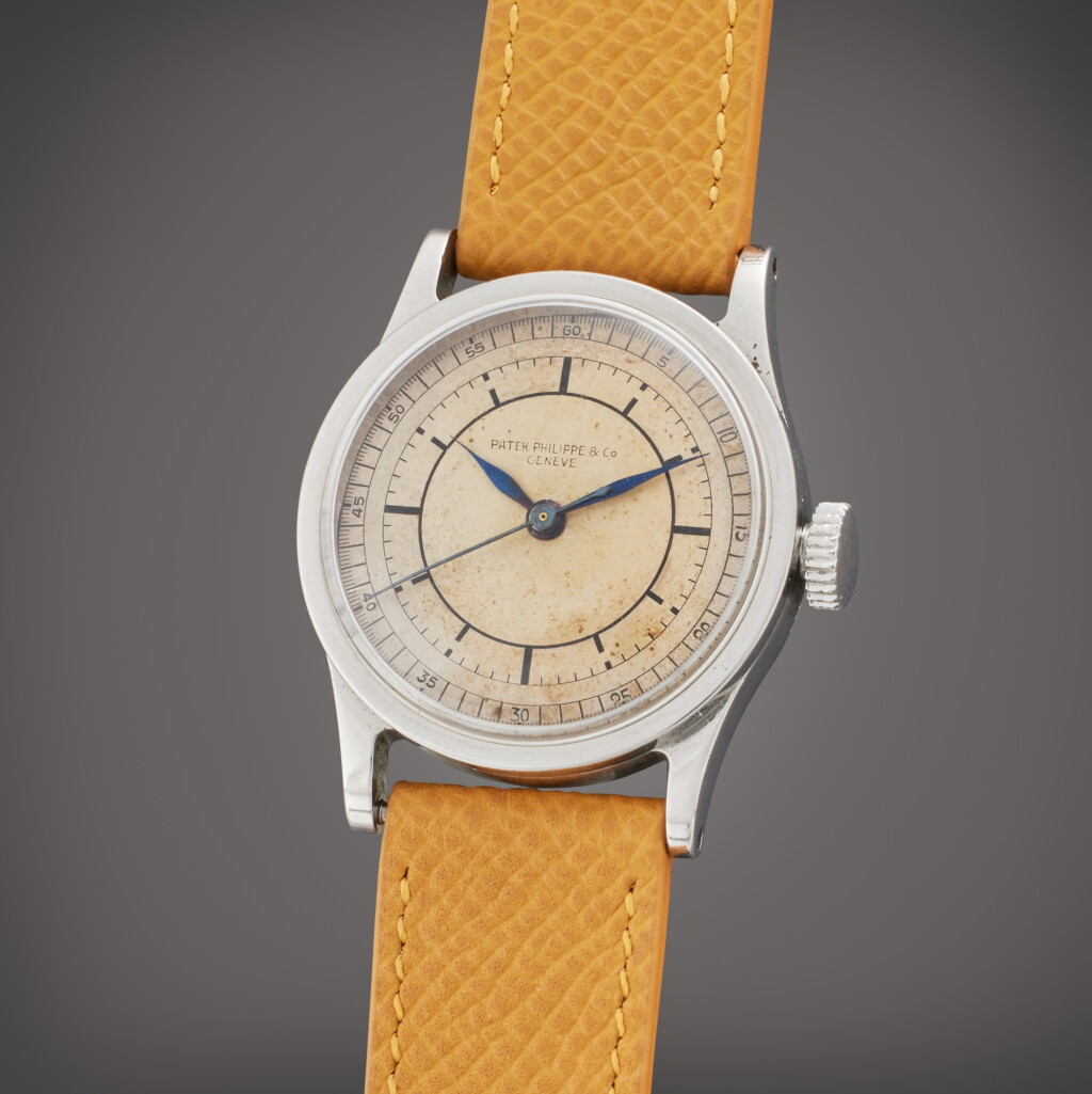 View full screen - View 1 of Lot 100. Reference 96 | A stainless steel wristwatch with sector dial, Made in 1914 and Sold in 1936.