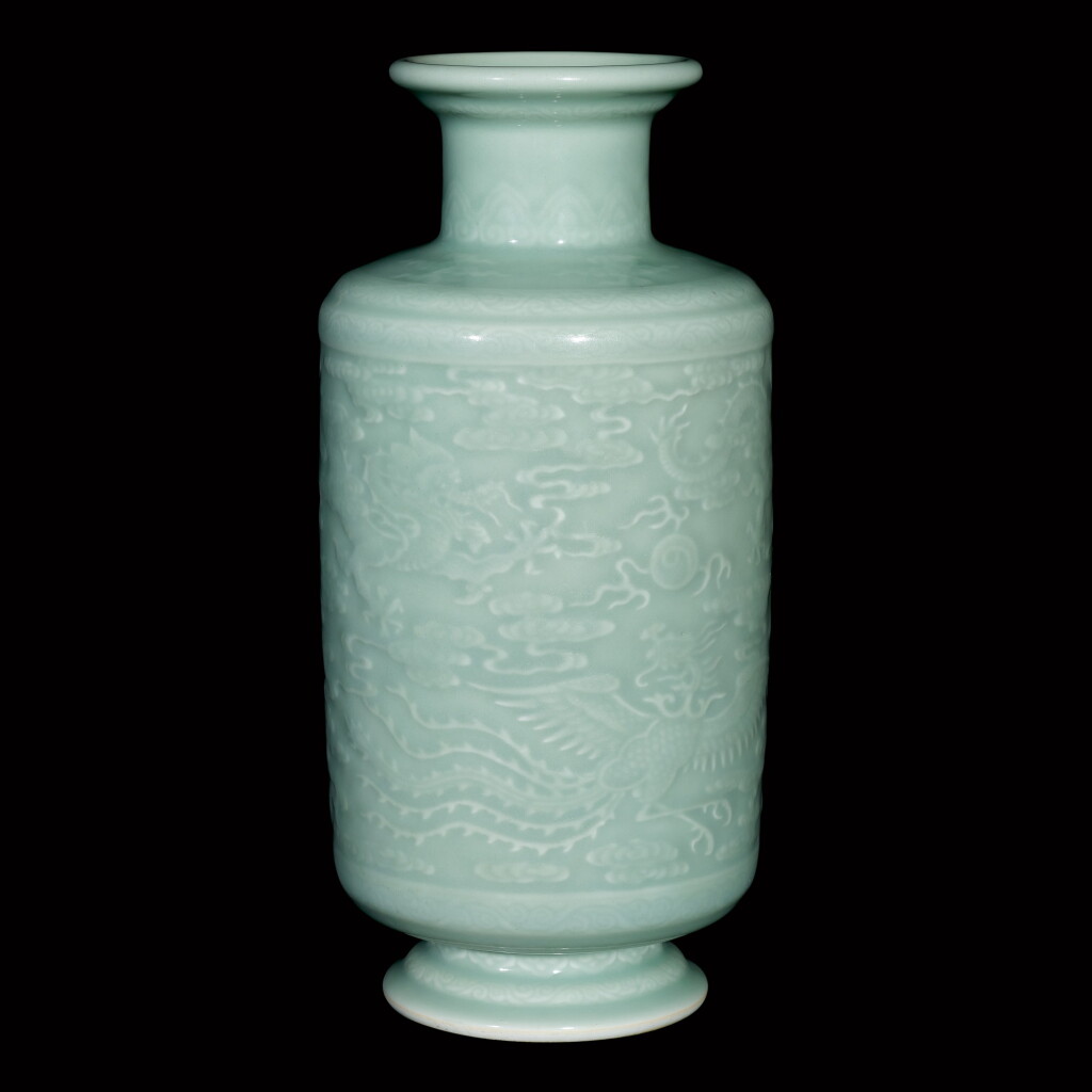 View full screen - View 1 of Lot 22. A rare carved celadon-glazed 'dragon and phoenix' vase Seal mark and period of Yongzheng | 清雍正 粉青釉龍鳳戲珠紋燈籠瓶 《大清雍正年製》款.