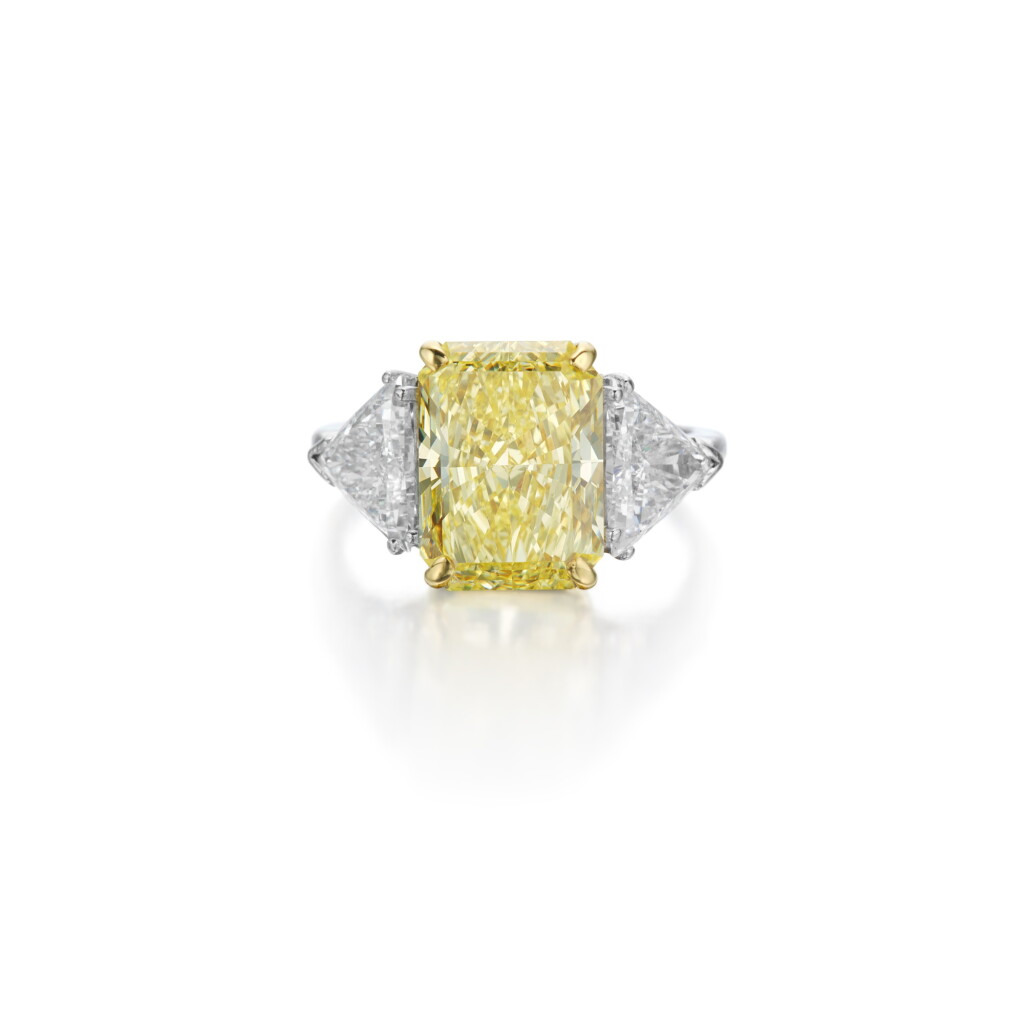 View full screen - View 1 of Lot 409. Fancy Intense Yellow Diamond and Diamond Ring.