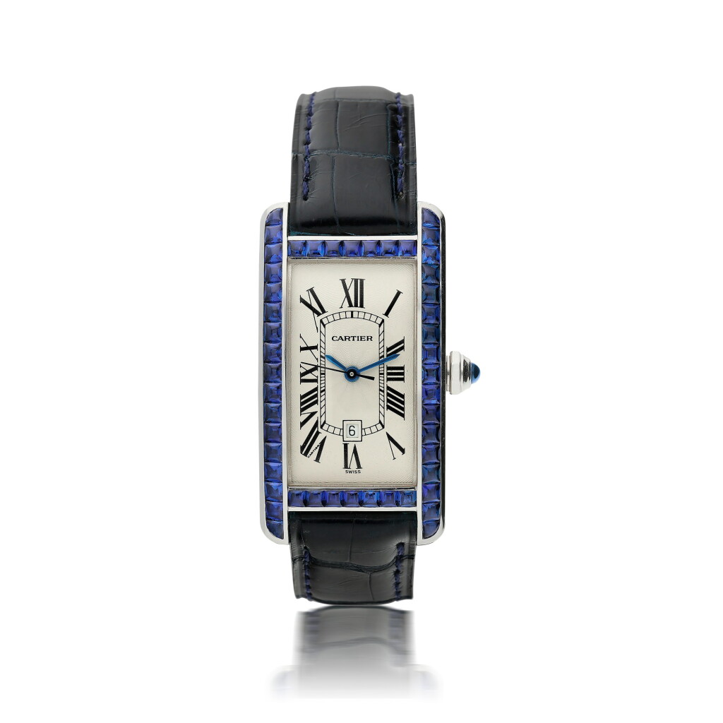 View full screen - View 1 of Lot 26. CARTIER | REFERENCE 2346 TANK AMERICAINE A WHITE GOLD AND SAPPHIRE SET RECTANGULAR AUTOMATIC WRISTWATCH WITH DATE, CIRCA 2010.