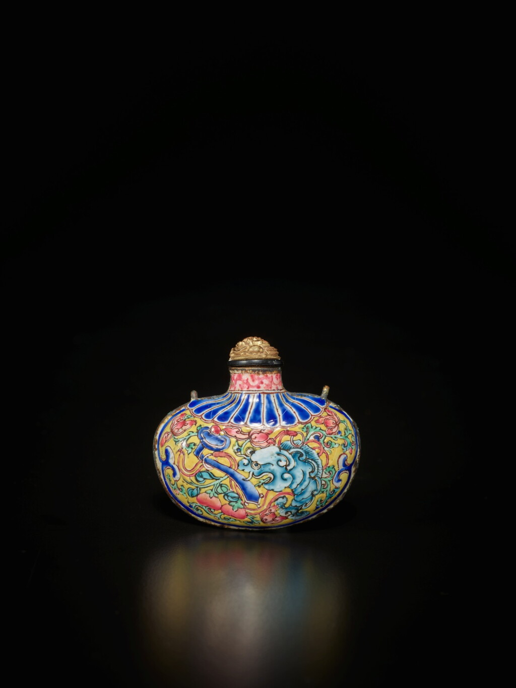 View full screen - View 1 of Lot 70. A Canton enamel pouch-form 'fish-dragon' snuff bottle, Qing dynasty, late Kangxi - early Qianlong period | 清康熙末至乾隆初 銅胎畫琺瑯魚龍紋荷包式鼻煙壺.