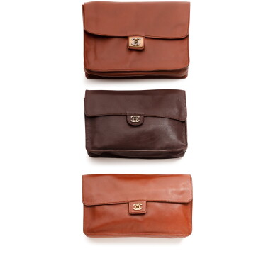 View full screen - View 1 of Lot 643. Frances Patiky Stein's Collection: Set of Three Pochettes, Chocolate and Cognac Lambskin leather.