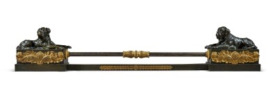 View full screen - View 1 of Lot 61. AN EMPIRE STYLE STEEL, PATINATED AND GILT-BRONZE FENDER, EARLY 20TH CENTURY.