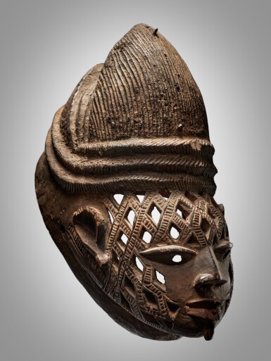 View full screen - View 1 of Lot 58. Yoruba-Nago Helmet Mask, attributed to Arobatan, Pobè, Republic of Benin.