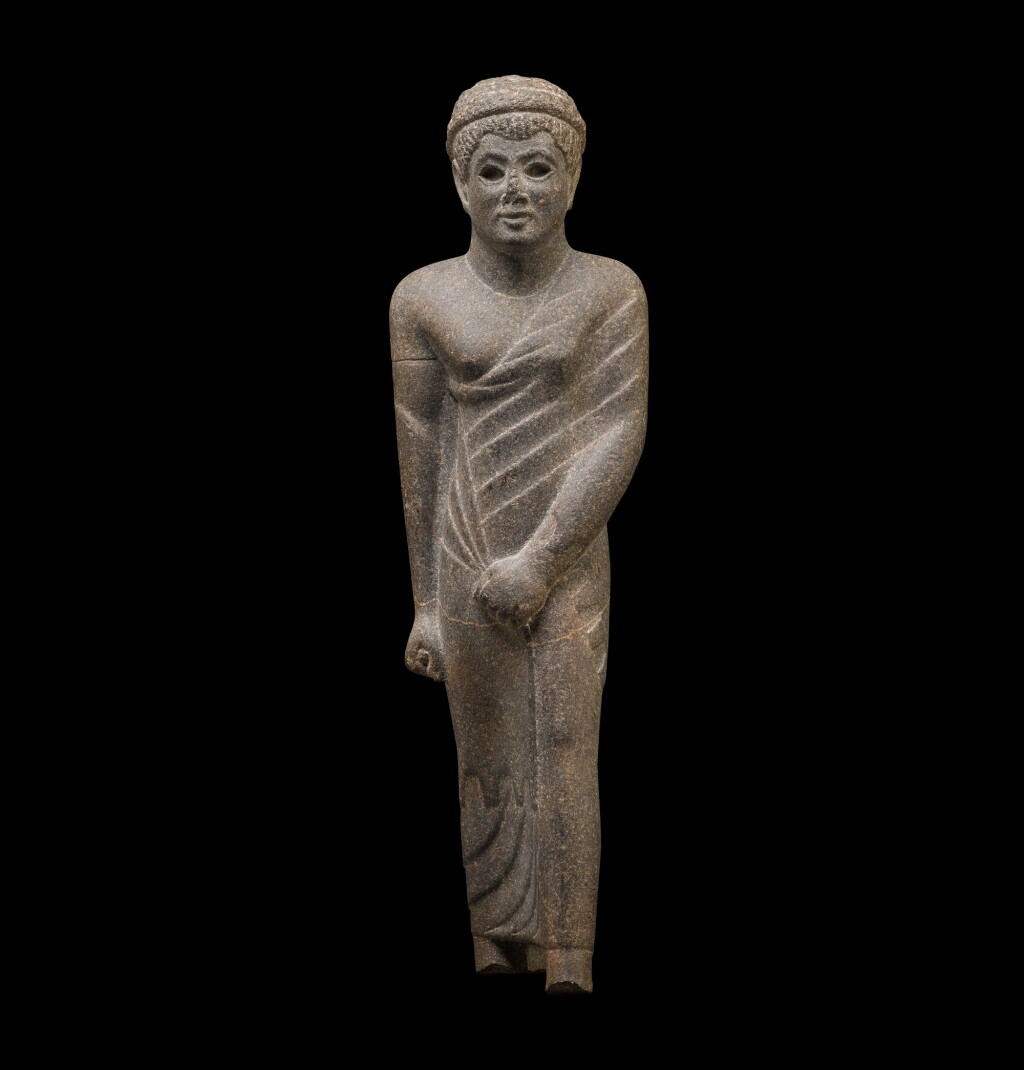 View full screen - View 1 of Lot 60. AN EGYPTIAN GRANITE FIGURE OF PAKHOM, GOVERNOR OF DENDERA, LATE PTOLEMAIC PERIOD, CIRCA 50-30 B.C..