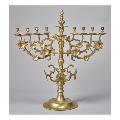 View full screen - View 1 of Lot 138. A LARGE POLISH BRASS HANUKAH LAMP, 18TH/19TH CENTURY.