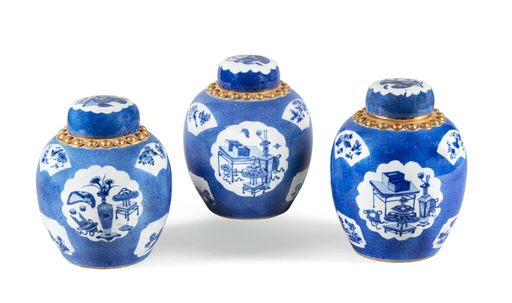 View full screen - View 1 of Lot 98. Three powder blue-ground 'precious antiques' jars and covers, Qing dynasty, 18th-19th century | 清十八至十九世紀 青花開光博古花卉紋蓋罐三件.