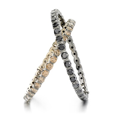 View full screen - View 1 of Lot 38. Two diamond bangles.
