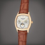 Reference 5940J-001 | A yellow gold automatic perpetual calendar wristwatch with moon phases and leap year indication, Circa 2015